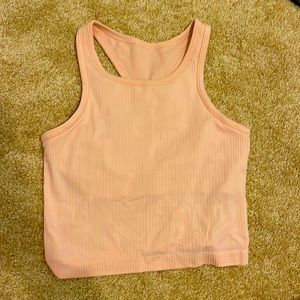 Pink cropped Lululemon Ebb to Street tank size 6